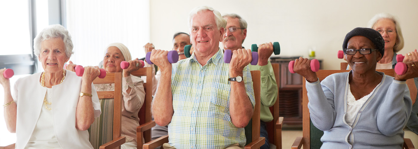 Older adults doing seated exercises