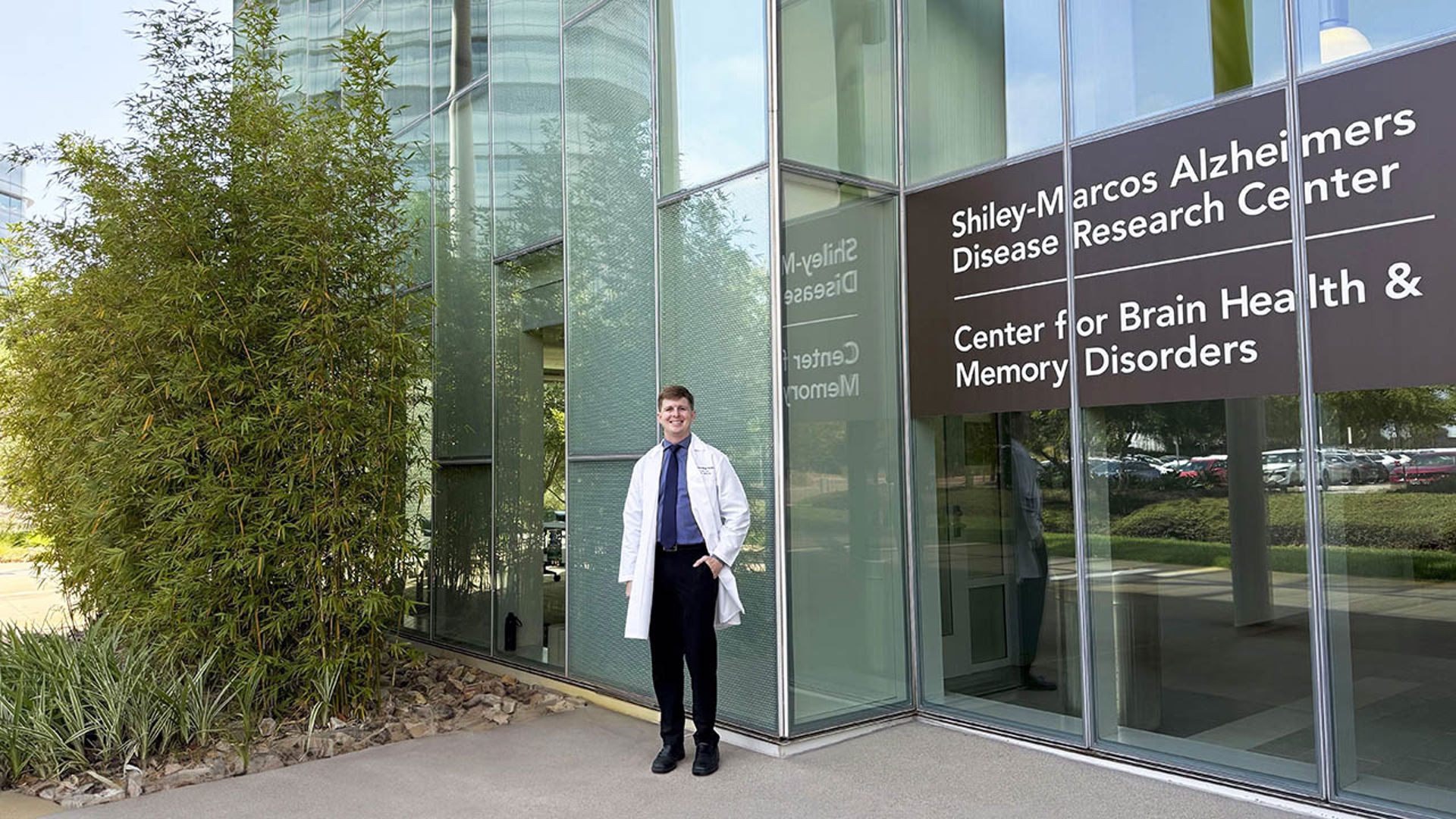Ian Neel, MD, in white coat