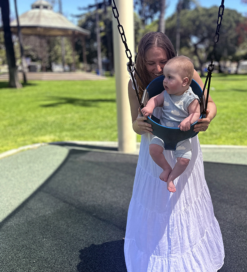 Unetic with child on swing