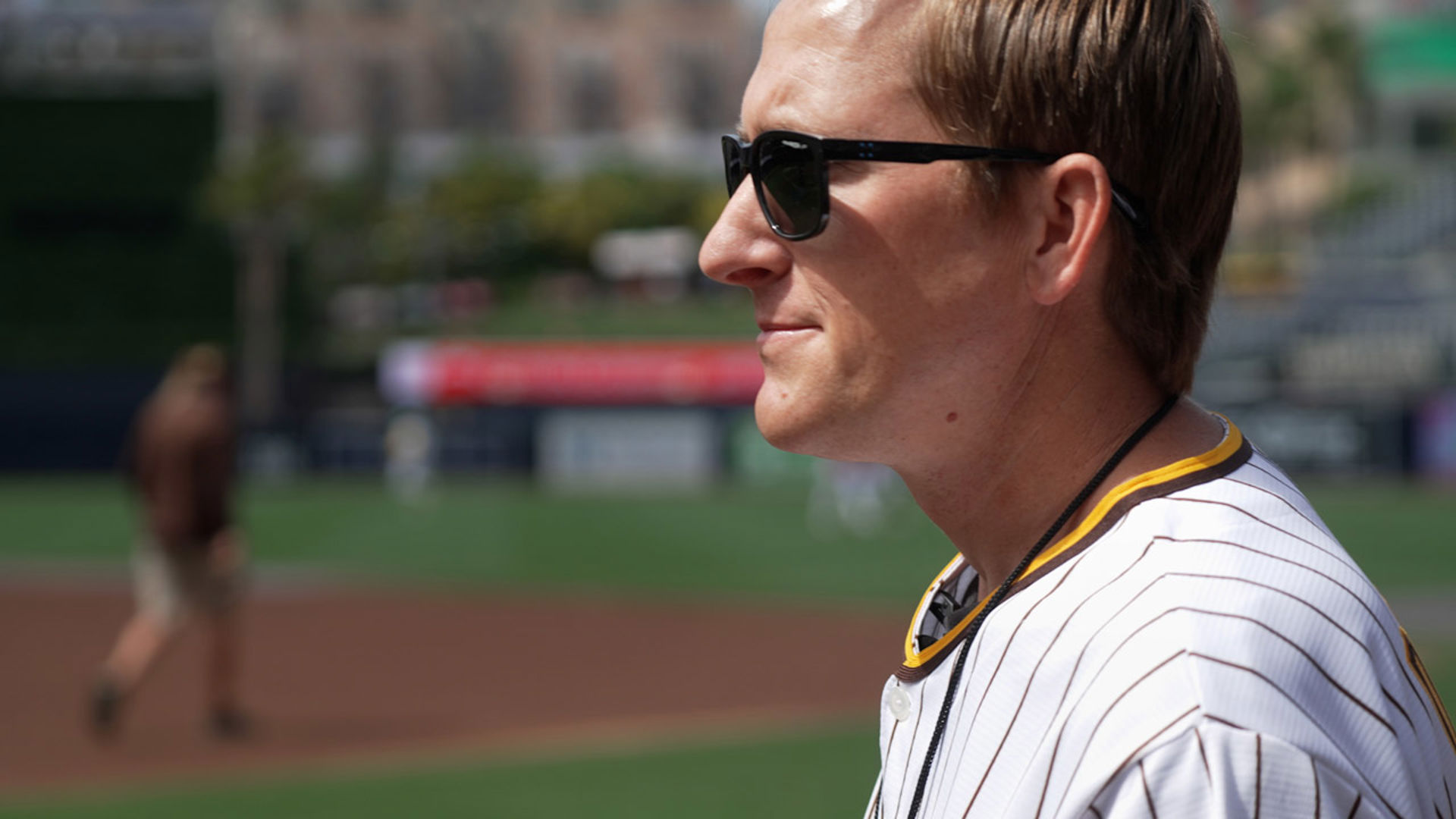 Brain tumor patient Andrew Dower wearing a Padres jersey