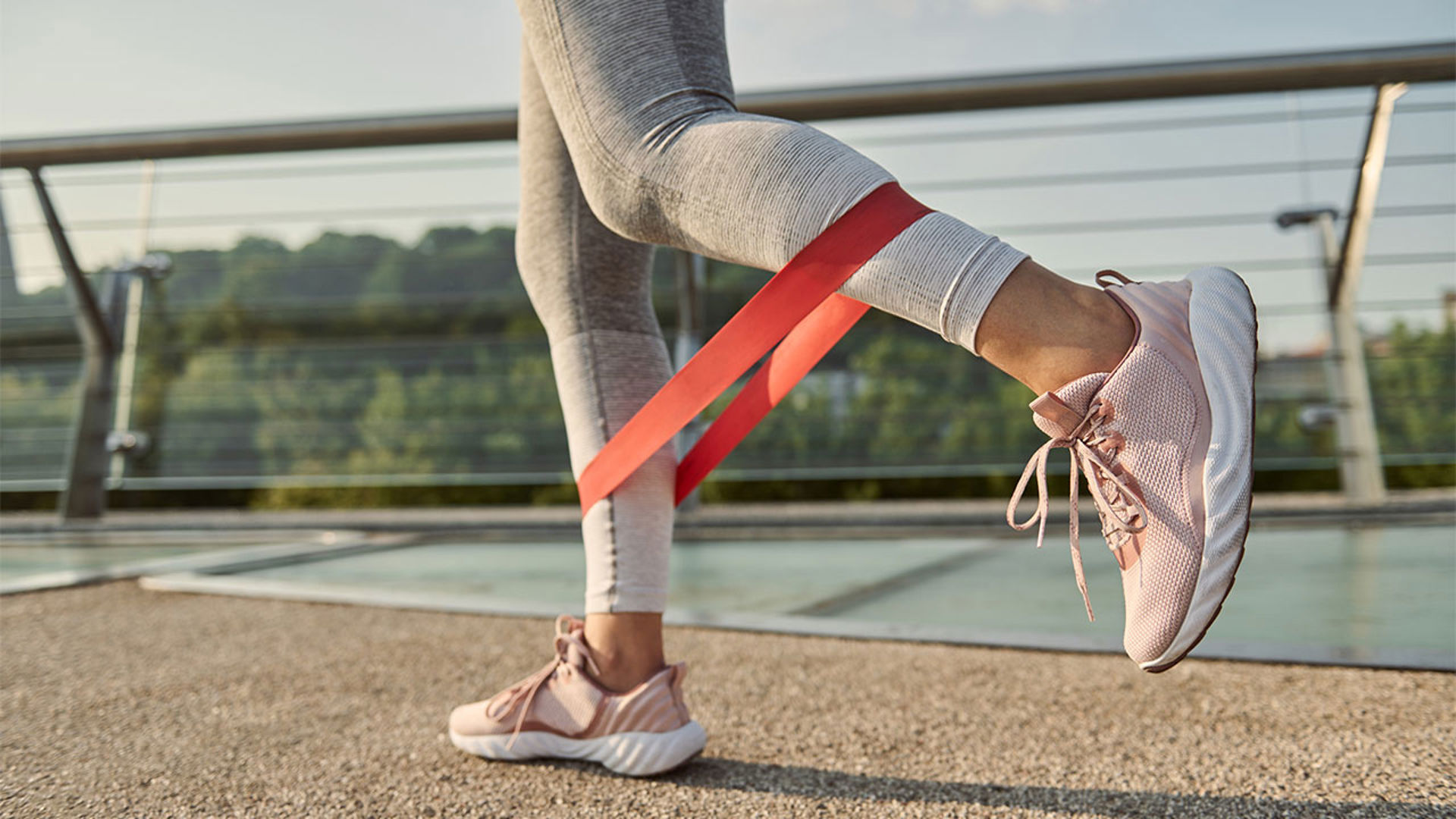 shows exercise band around feet 